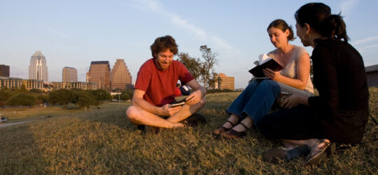 Baha'i Youth hosting a devotional gathering outside