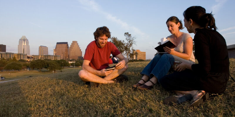 Baha'i Youth hosting a devotional gathering outside